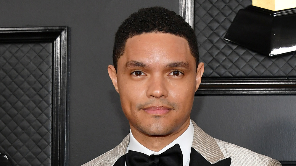 Trevor Noah stares at camera