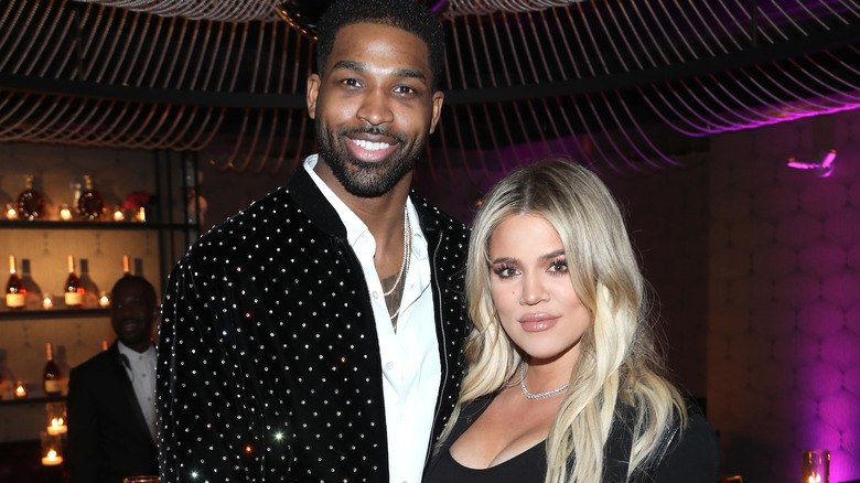 Tristan Thompson and Khloé Kardashian posing