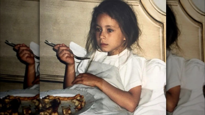 Troian Bellisario as a kid