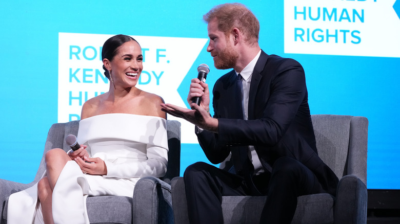 Meghan Markle and Prince Harry chatting