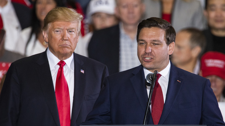 Donald Trump and Ron DeSantis speaking 