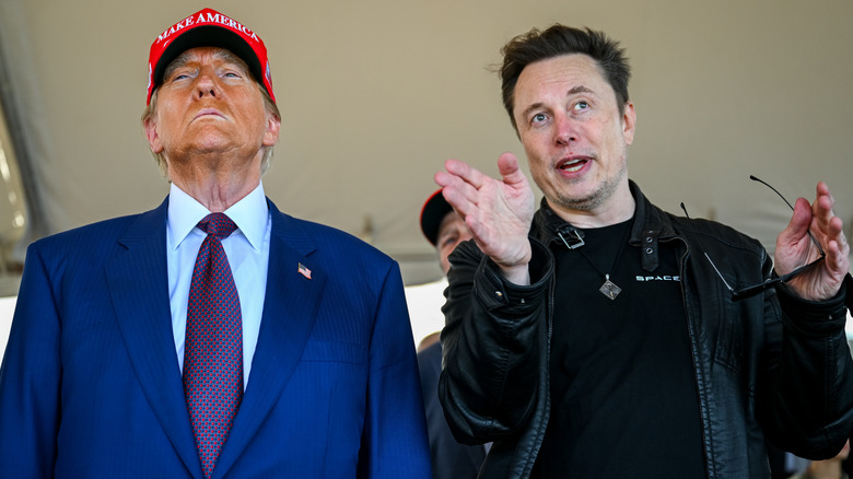 Donald Trump stoic as Elon Musk talks