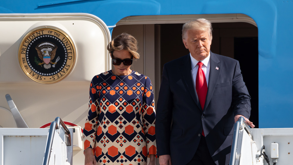 Melania and Donald Trump leave Air Force One on inauguration day, moving to Mar-A-Lago