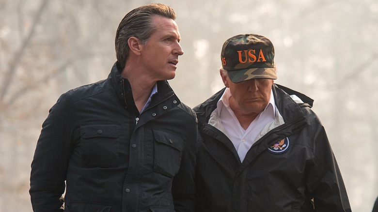 Gavin Newsom and Donald Trump walking