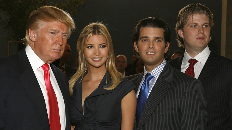 Donald Trump posing with his kids