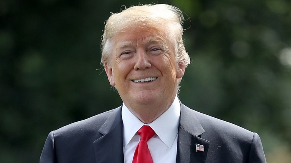 Former U.S. President Donald Trump smiling