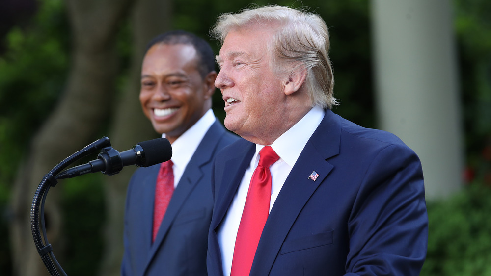 Donald Trump and Tiger Woods at the podium