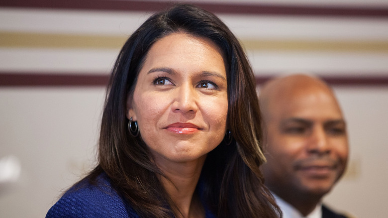 Tulsi Gabbard smirking