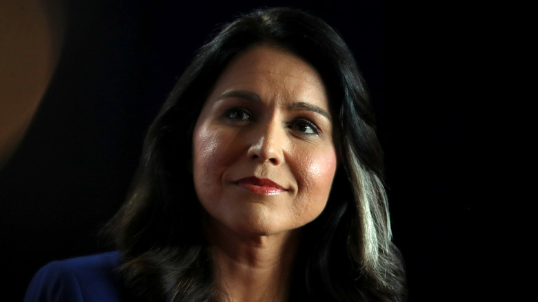 Tulsi Gabbard smirking