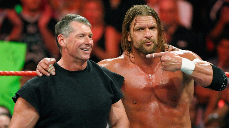 Vince McMahon and Triple H in the ring