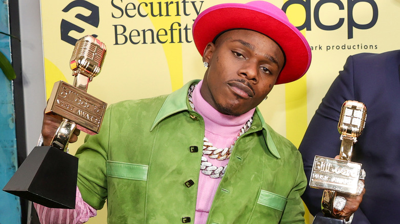 DaBaby poses at the 2021 Billboard Music Awards 