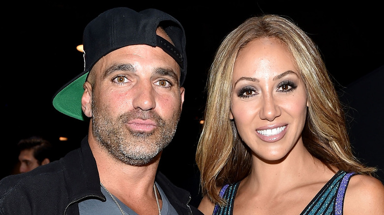 Joe Gorga pouting Melissa Gorga smiling