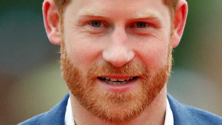 Prince Harry smiling with beard