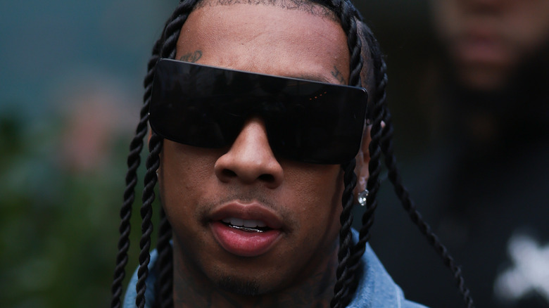 Tyga with oversized shades