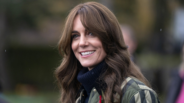 Kate Middleton smiling with bangs