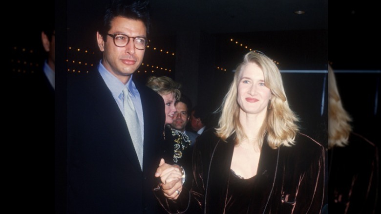 Laura Dern and Jeff Goldblum holding hands