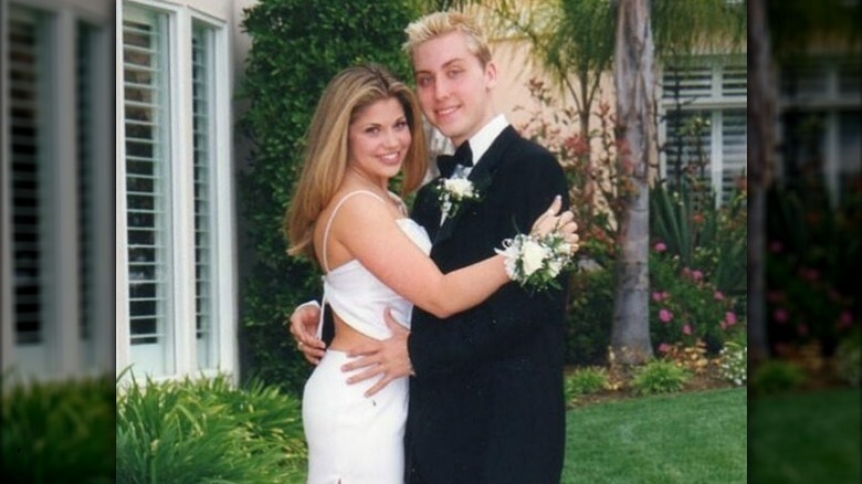 Danielle Fishel embracing Lance Bass