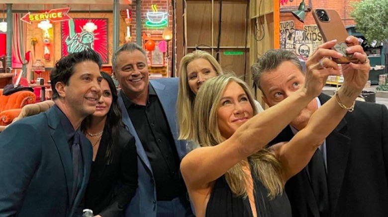 Jennifer Aniston taking selfie with Friends cast