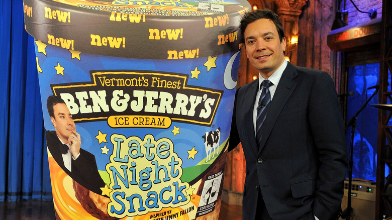 Jimmy Fallon posing with Late Night Snack ice cream sign