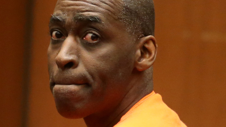 Michael Jace on trial, looking at camera