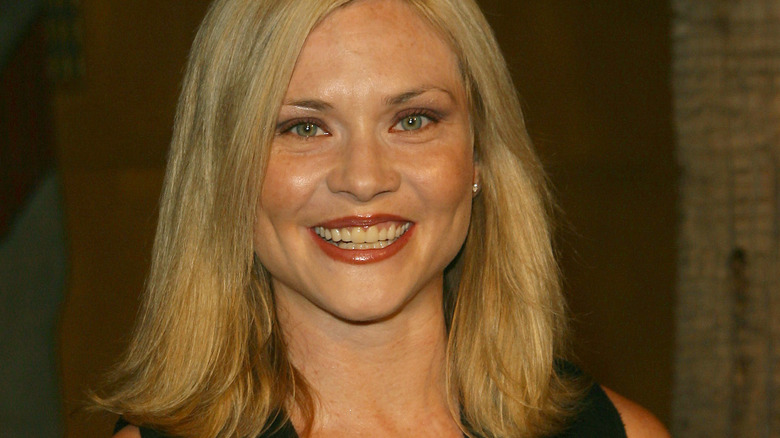 Amy Locane smiling