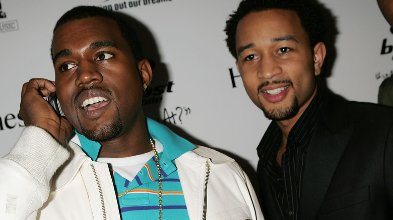 Kanye West and John Legend pose together