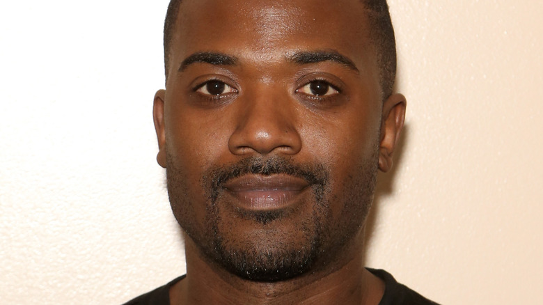 Ray J smiling