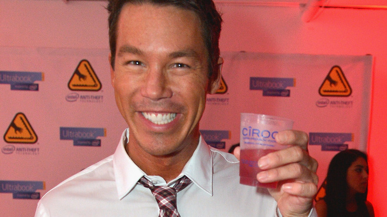 David Bromstad posing with drink