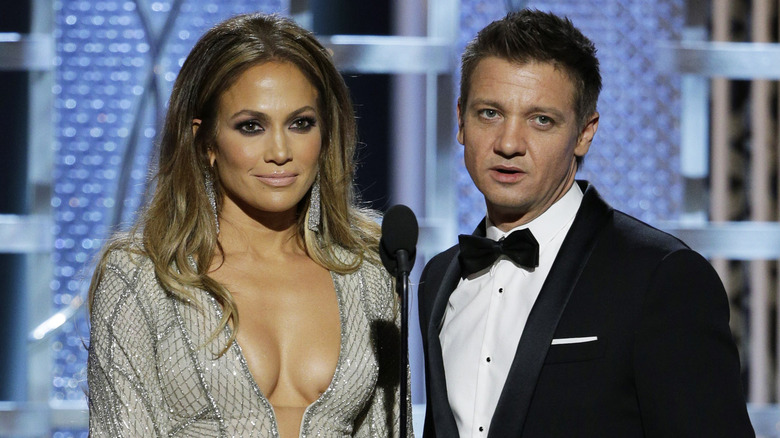 Jennifer Lopez and Jeremy Renner presenting an award