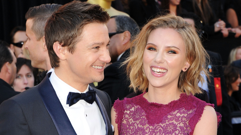 Jeremy Renner and Scarlett Johansson laughing