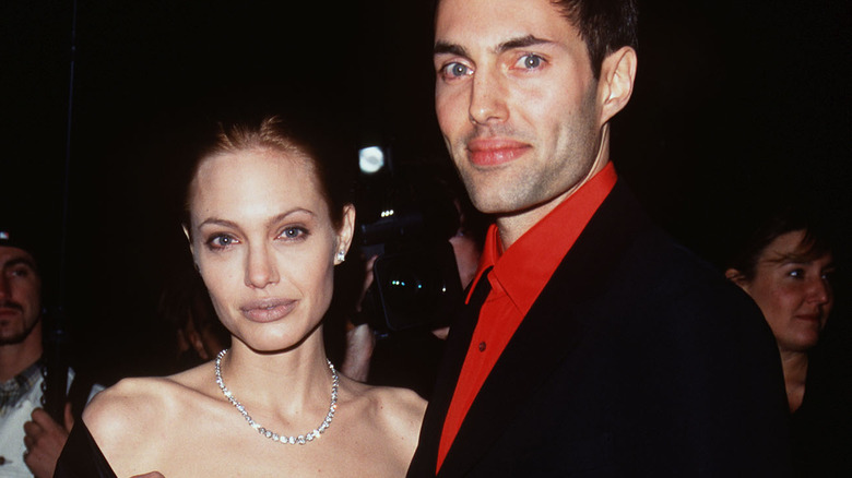 Angelina Jolie, James Haven posing