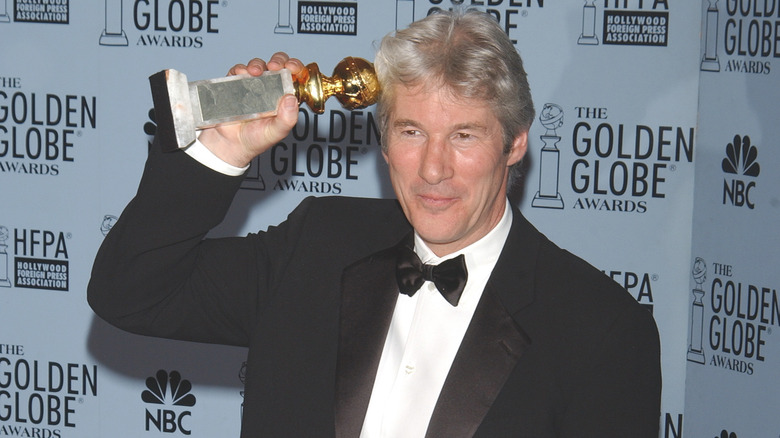 Richard Gere posing with "Chicago" Golden Globe