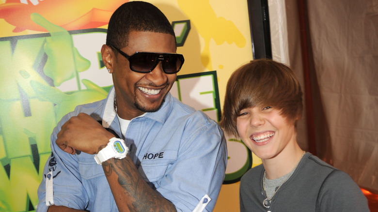 Usher and Justin Bieber smiling