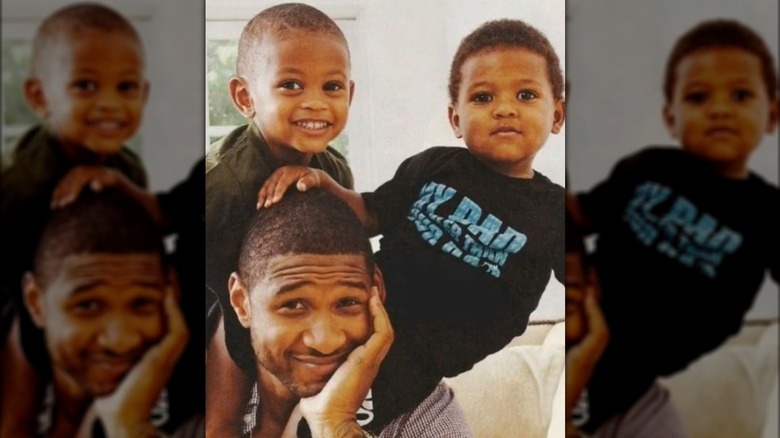 Usher posing with Usher V and Naviyd