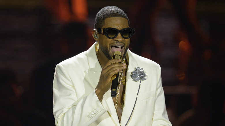 Usher performing