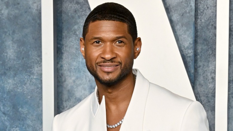 Usher posing