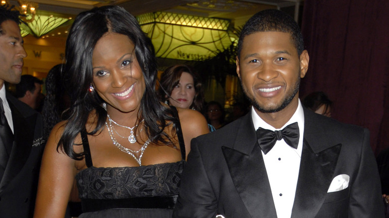 Tameka Foster and Usher smiling