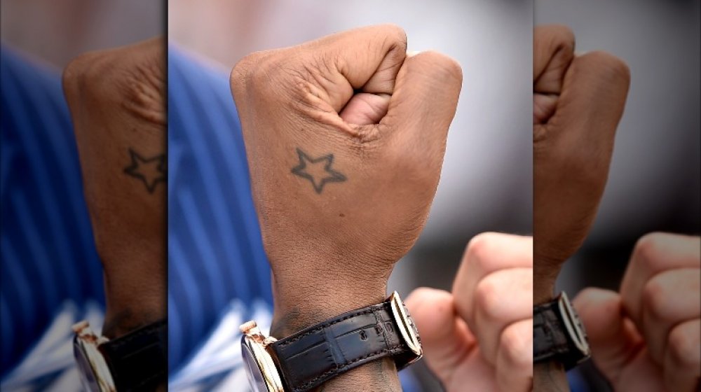 Usher's star tattoo