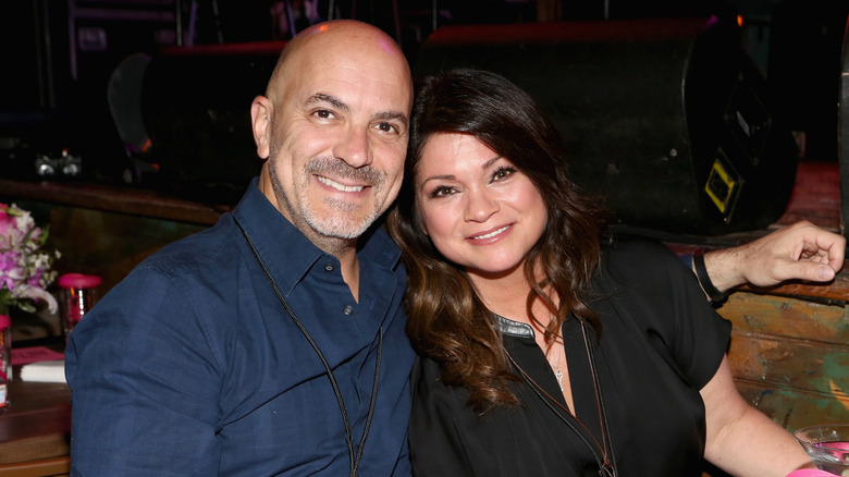 Tom Vitale with his arm around Valerie Bertinelli