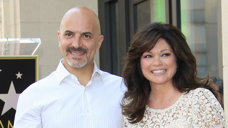 Tom Vitale posing with Valerie Bertinelli