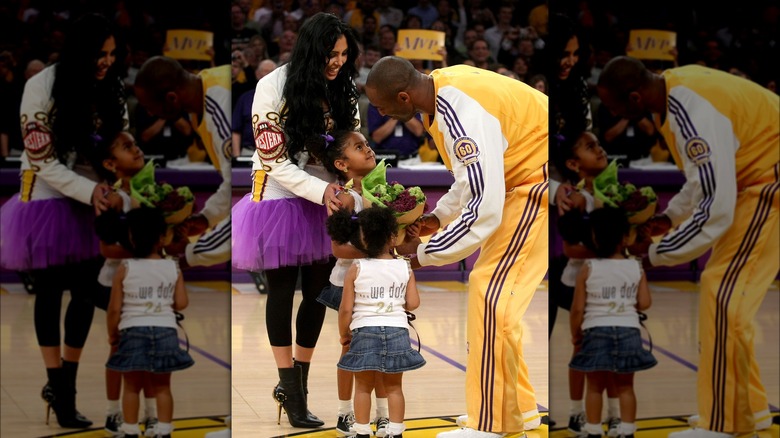 Vanessa and Kobe on the court when he received his MVP award