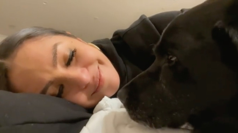 Vanessa Bryant snuggles with her dog 