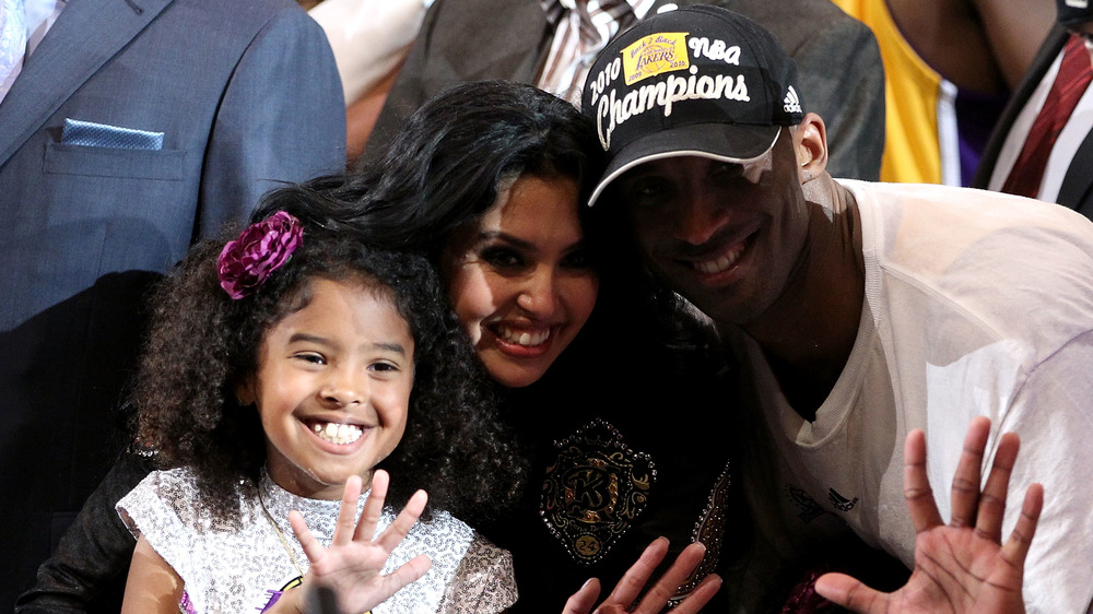 Vanessa Bryant and Kobe Bryant with there daughter