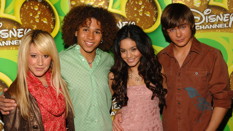Vanessa Hudgens poses with her 'High School Musical' co-stars