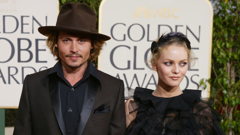 Johnny Depp and Vanessa Paradis pose on the red carpet