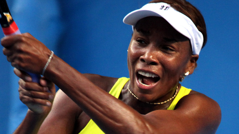 Venus Williams reacts on the court