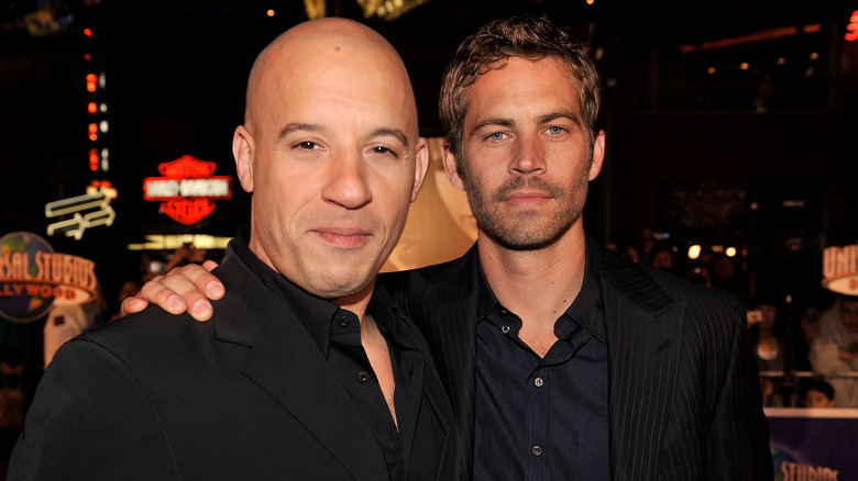 Vin Diesel and Paul Walker pose at an event