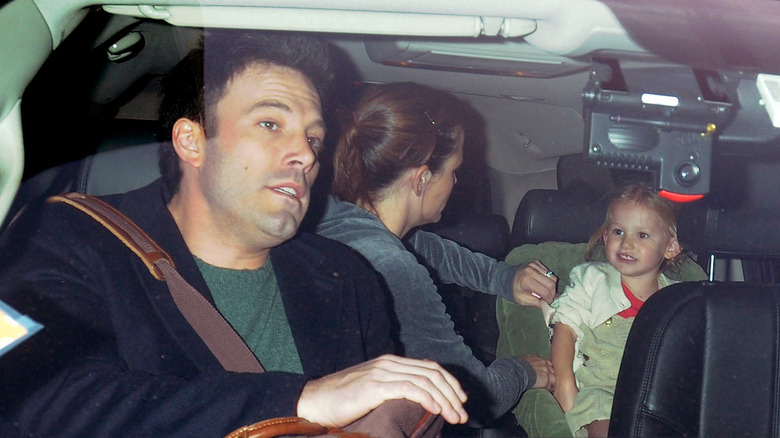 Violet Affleck as toddler with parents