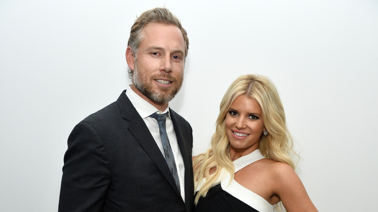 Jessica Simpson poses with her husband Eric Johnson