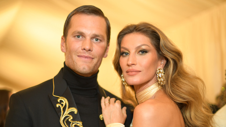 Tom Brady and Gisele Bündchen pose together at event